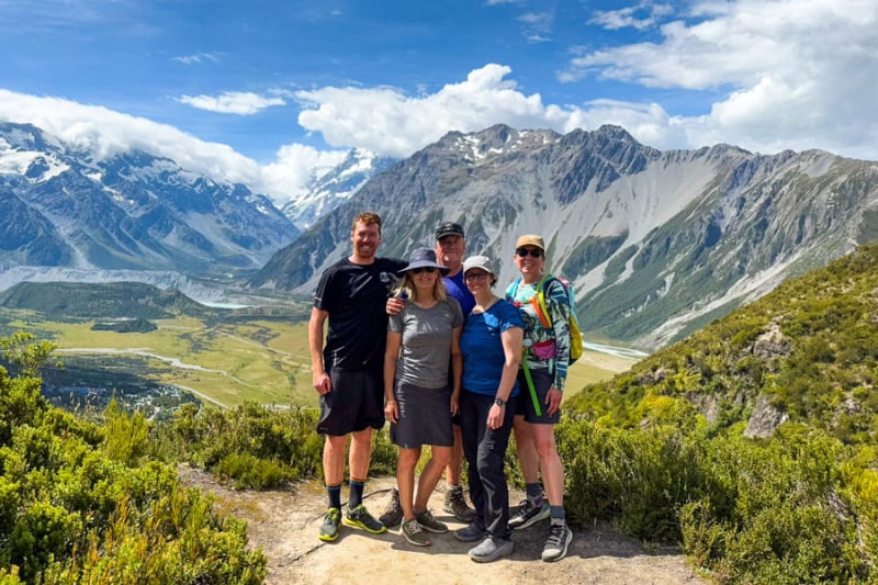 guide ryan with group hiking red tarns mt cook national park